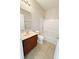Well-lit bathroom with a tub, shower combo, vanity, and toilet, creating a comfortable and functional space at 1208 Sawgrass Pointe Dr, Orlando, FL 32824