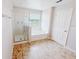 Bathroom with a walk-in shower, bathtub, and neutral flooring at 1208 Sawgrass Pointe Dr, Orlando, FL 32824