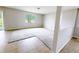 Neutral bonus room with carpet and tile flooring and one windows offering plenty of natural light at 1208 Sawgrass Pointe Dr, Orlando, FL 32824