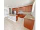Spacious kitchen featuring granite countertops, stainless steel appliances, and ample cabinet space at 1208 Sawgrass Pointe Dr, Orlando, FL 32824
