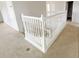Upstairs landing featuring a white staircase, neutral carpet and lots of natural light at 1208 Sawgrass Pointe Dr, Orlando, FL 32824