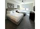 Spacious bedroom with two queen beds and contemporary decor at 14501 Grove Resort Ave # 3640, Winter Garden, FL 34787