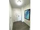 Bright and airy entryway with wood-look floors at 14501 Grove Resort Ave # 3640, Winter Garden, FL 34787