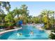 Relaxing lazy river pool perfect for floating and enjoying the sun at 14501 Grove Resort Ave # 3640, Winter Garden, FL 34787