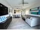 Open living area with comfortable seating and dining area at 14501 Grove Resort Ave # 3640, Winter Garden, FL 34787