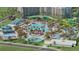 Resort-style pool area with multiple pools, water slides and a spa at 14501 Grove Resort Ave # 3640, Winter Garden, FL 34787