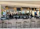 Relaxing resort bar with wicker chairs and tropical lighting at 14501 Grove Resort Ave # 3640, Winter Garden, FL 34787