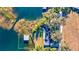Lakefront property with a boathouse and large lot at 647 Ridgewood Dr, Windermere, FL 34786