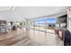 Spacious living room with lake views and hardwood floors at 647 Ridgewood Dr, Windermere, FL 34786