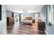 Spacious main bedroom with ceiling fan, wood flooring, and private balcony access at 647 Ridgewood Dr, Windermere, FL 34786
