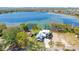 Aerial view of property showcasing the spacious backyard and serene lake views at 1340 Susannah Blvd, Orlando, FL 32803