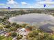 Aerial view of property lot and surrounding lake, showing proximity to airport and Orlando downtown at 1340 Susannah Blvd, Orlando, FL 32803