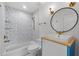 Charming bathroom with updated fixtures and a beautifully tiled shower/tub at 1340 Susannah Blvd, Orlando, FL 32803