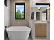 A soaking tub beneath a window complements this bathroom's modern design and fixtures at 1340 Susannah Blvd, Orlando, FL 32803