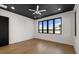 Bright room featuring a dark ceiling, hardwood floors, and waterfront views at 1340 Susannah Blvd, Orlando, FL 32803