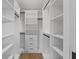 Organized walk-in closet featuring custom shelving, drawers, and ample storage space at 1340 Susannah Blvd, Orlando, FL 32803