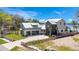 Beautiful waterfront home with a modern design, lush landscaping, and a private dock at 1340 Susannah Blvd, Orlando, FL 32803