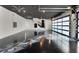 Garage features epoxy floors, industrial lighting, a black ceiling, and white brick walls at 1340 Susannah Blvd, Orlando, FL 32803