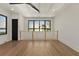 Bright living room with wood floors and views of the lake at 1340 Susannah Blvd, Orlando, FL 32803