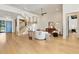 Open-concept living room with lots of natural light, modern furniture, and a staircase at 1340 Susannah Blvd, Orlando, FL 32803