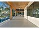 An outdoor pool and an outdoor kitchen on a covered patio at 1340 Susannah Blvd, Orlando, FL 32803