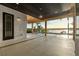 Relaxing covered patio overlooking waterfront views at 1340 Susannah Blvd, Orlando, FL 32803