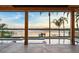 Beautiful waterfront view from the outdoor patio of the pool and landscaping at 1340 Susannah Blvd, Orlando, FL 32803