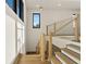 Staircase featuring modern wood railing with white cable at 1340 Susannah Blvd, Orlando, FL 32803