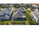 Aerial view of home with pool and lush landscaping at 1402 Olympic Club Blvd, Champions Gate, FL 33896