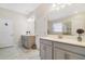 Double vanity bathroom with modern fixtures and ample counter space at 1402 Olympic Club Blvd, Champions Gate, FL 33896