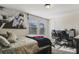 Bright bedroom with gaming setup and large wall decor at 1402 Olympic Club Blvd, Champions Gate, FL 33896