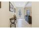 Bright entryway with tile flooring and a stained glass door at 1402 Olympic Club Blvd, Champions Gate, FL 33896
