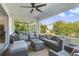 Spacious screened lanai with outdoor seating and backyard access at 1402 Olympic Club Blvd, Champions Gate, FL 33896