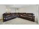 Relaxing living room with a large sectional sofa at 1402 Olympic Club Blvd, Champions Gate, FL 33896