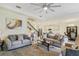 Spacious living room with ample natural light and comfortable seating at 1402 Olympic Club Blvd, Champions Gate, FL 33896