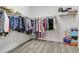 Large walk-in closet with ample shelving and hanging space at 1402 Olympic Club Blvd, Champions Gate, FL 33896