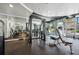 Well-equipped gym featuring a variety of exercise machines and mirrored walls at 155 S Court Ave # 1602, Orlando, FL 32801