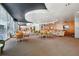 Inviting lounge area with comfortable seating, wood paneled wall and large windows at 155 S Court Ave # 1602, Orlando, FL 32801