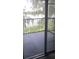 Relaxing balcony offering serene views of a lake and surrounding greenery at 3946 Versailles Dr # 3946B, Orlando, FL 32808