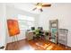 Functional home office with hardwood floors, natural light, and well-organized storage solutions at 1392 Indiana Ave, Winter Park, FL 32789
