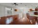 Spacious open-concept living room with hardwood floors, lots of natural light, and modern finishes at 1392 Indiana Ave, Winter Park, FL 32789