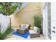 Charming patio area with comfortable seating and lush greenery, creating a serene outdoor space at 1392 Indiana Ave, Winter Park, FL 32789