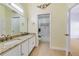 Charming bathroom with granite countertops, double sinks, and access to shower at 2226 Lake Marion Dr, Apopka, FL 32712