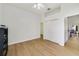 Neutral bedroom featuring light hardwood floors and closet at 2226 Lake Marion Dr, Apopka, FL 32712