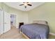 Comfortable bedroom, featuring hardwood floors, with easy access to the rest of the house at 2226 Lake Marion Dr, Apopka, FL 32712