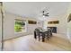 Dining room with natural light, neutral colors, and backyard views at 2226 Lake Marion Dr, Apopka, FL 32712