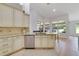 Kitchen island featuring granite countertop and stainless steel dishwasher at 2226 Lake Marion Dr, Apopka, FL 32712