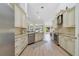 Bright kitchen featuring stainless appliances, granite counters, and backyard views at 2226 Lake Marion Dr, Apopka, FL 32712