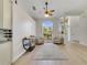 Inviting living space featuring wood floors, large windows, and stylish decor, creating a cozy and elegant atmosphere at 2226 Lake Marion Dr, Apopka, FL 32712