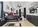 Large main bedroom with a ceiling fan, black-out curtains, and ensuite bathroom at 2226 Lake Marion Dr, Apopka, FL 32712